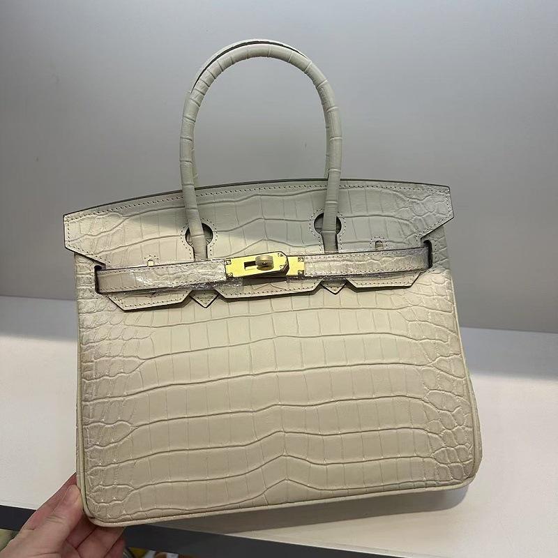 Pelle bovina primo strato motivo alligatore opaca portatile a spalla a tracolla borsa da donna premium transfrontaliera