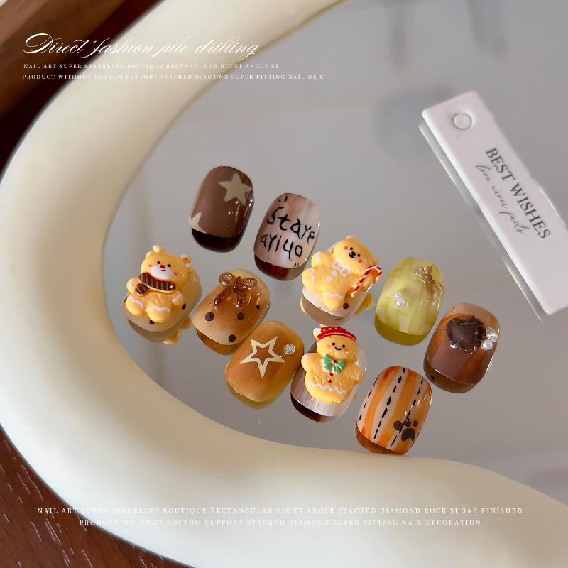 10 ks Kawaii Vánoční perníček los pryskyřičné ozdoby na nehty kreslené kreativní žlutý medvídek sněhulák dekorace na nehty DIY nehty