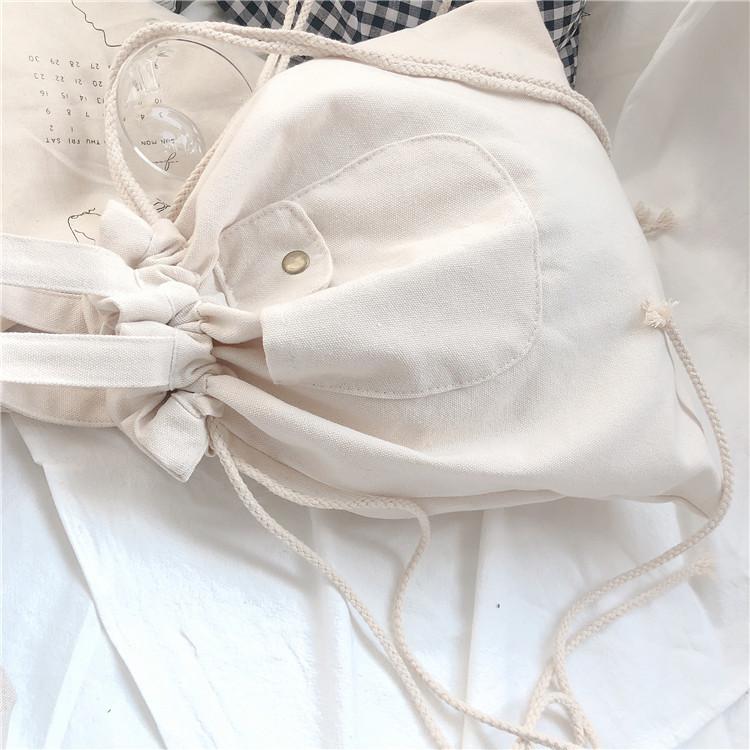 

Department ins canvas bag, new portable drawstring shoulder bag, literary plaid student cloth bag.