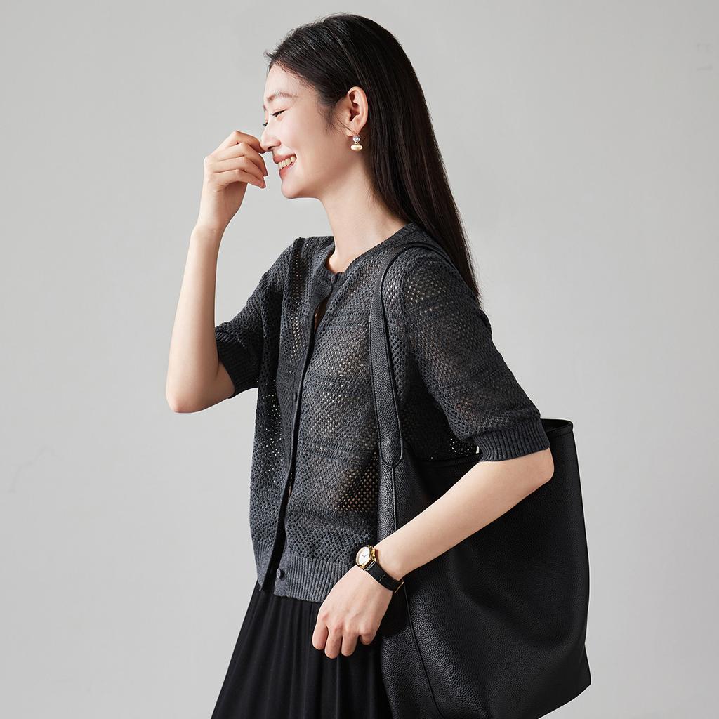Round neck single breasted hollow knitted sweater for women in spring 2026, fashionable and versatile, slimming casual top