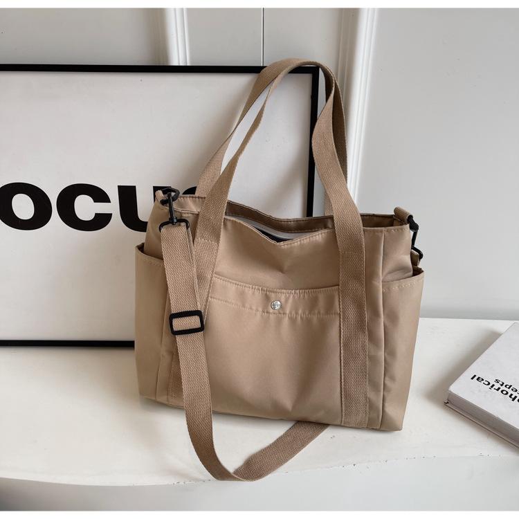 

Canvas bag women s new fashionable versatile shoulder bag to work commuter bag Korean version oblique span bag large-capacity tote bag хаки
