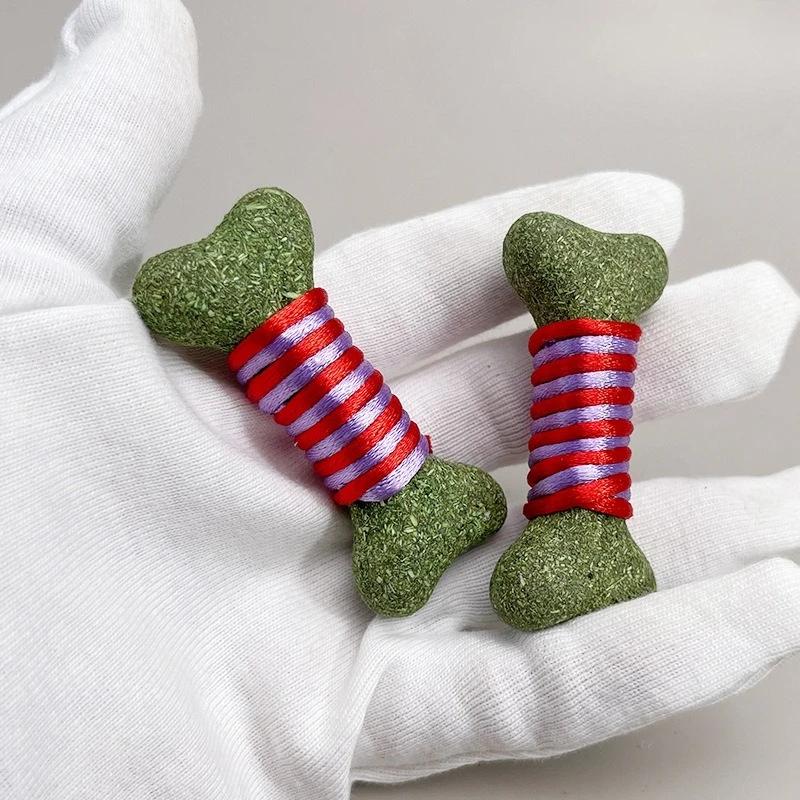 

Rope Wound Bone Cat Grass Toys Cat Catnip Ball Toys,Cat Self-Entertainment Toys, Cat Snack,Kitty Teeth Cleaning Lick Dental Toys 1 Piece