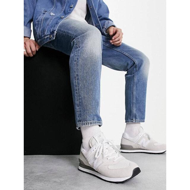 

Белые кроссовки New Balance 574 с серыми деталями