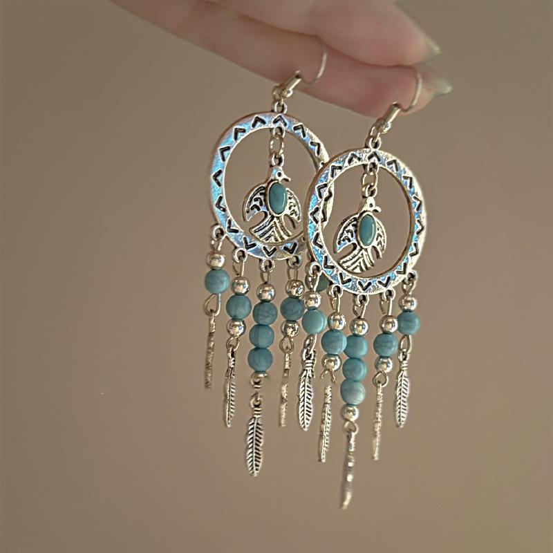 Retro Ethnic Bell Tassel Earrings: Exquisite, Fashionable Dangle Design with Light Luxury Appeal.