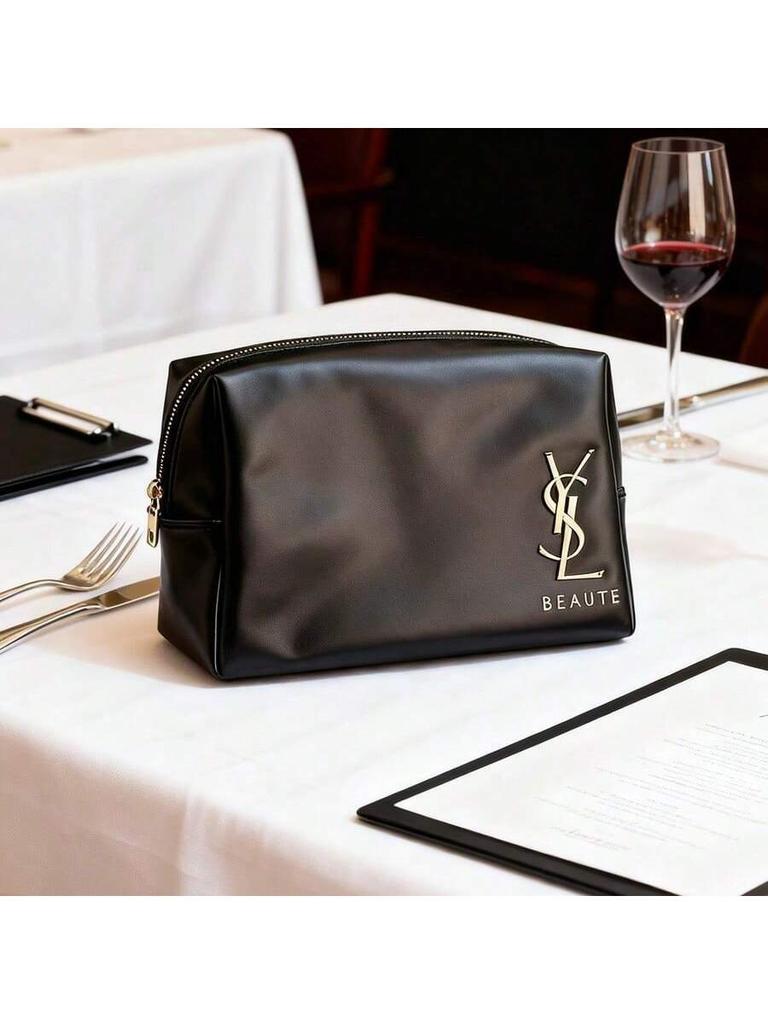 YSL - Black patent leather cosmetic bag with gold logo and zipper closure
