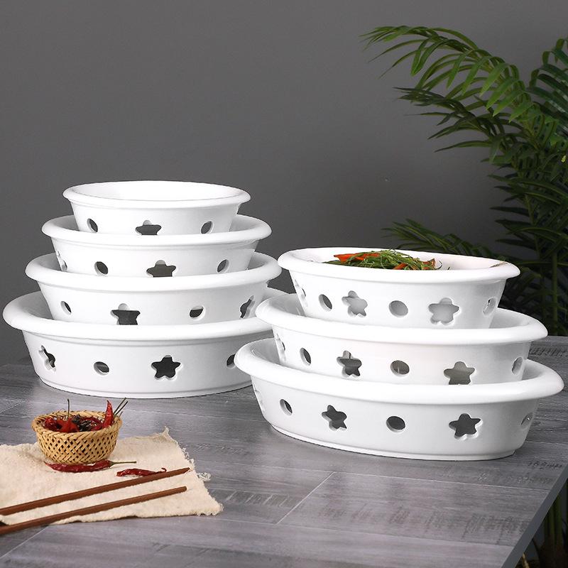 Ceramic Egg-Shaped Plum Blossom Grilled Fish and Warming Plate with White Round Heating Dry Pot Stove.