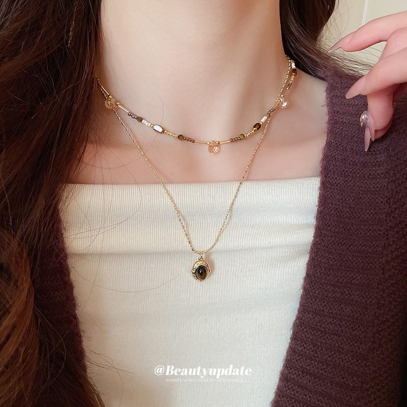 Retro Tiger Eye Stone Necklace - Versatile Maillard Style for Autumn & Winter Sweaters, High-End Luxury Accessory.