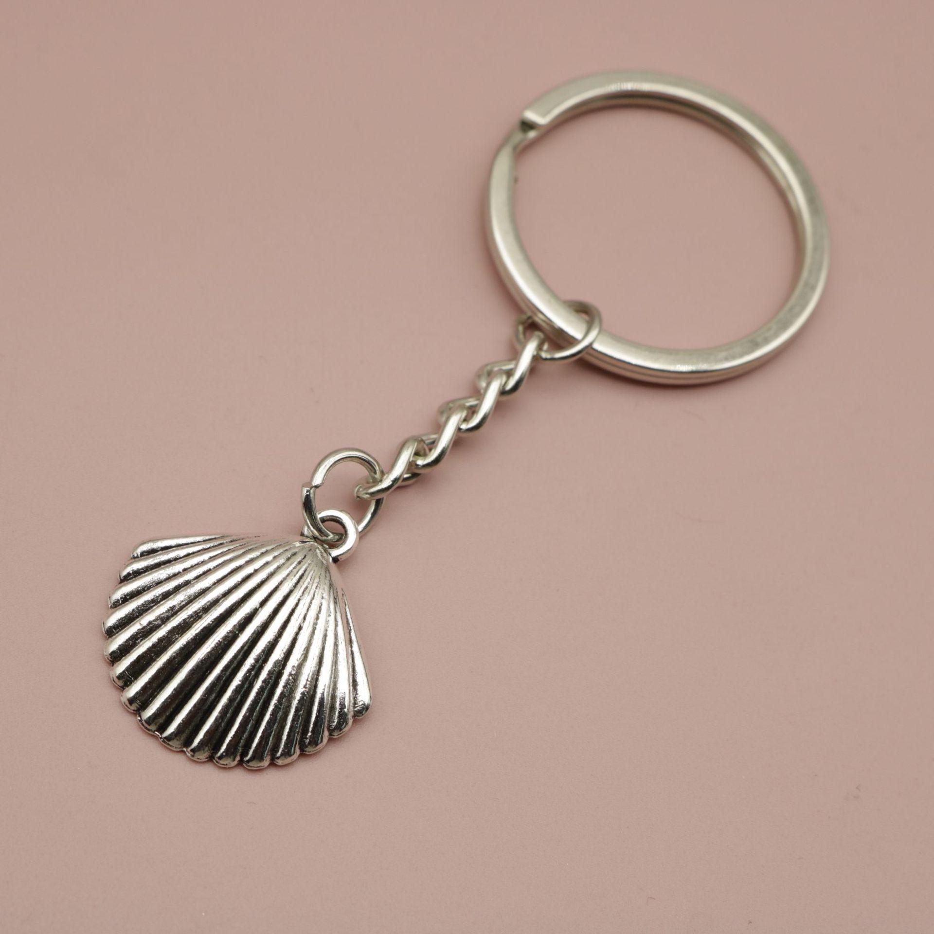 Xiyin Stylish Shell Keychain Pendant серебряный