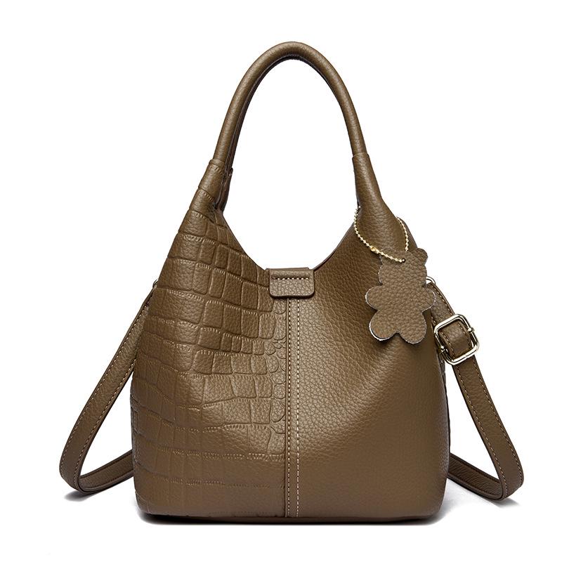 2025 High-End Genuine Leather Women's Shopping Basket Bag with Double-Sided Texture and Leather Tag.