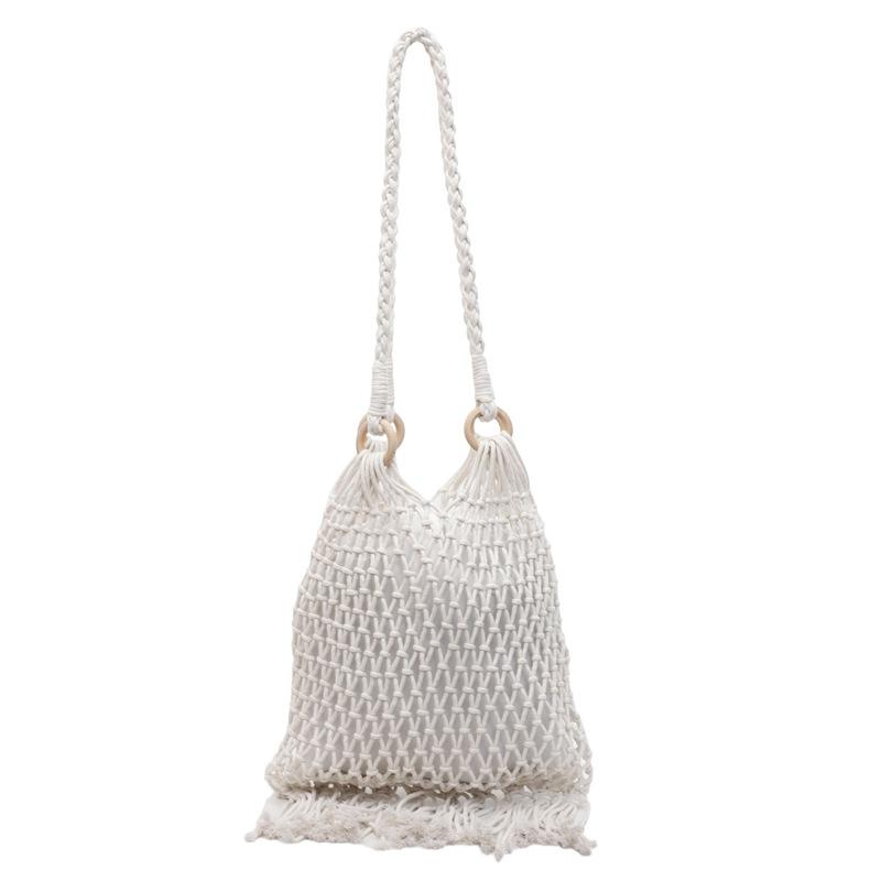 Women's Bag Large-capacity New Summer Leisure Shoulder Shopping Bag Hollow Tassel Woven Bag Bucket Bag