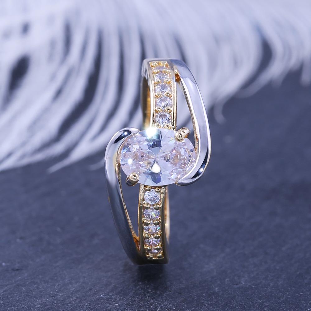 Modeschmuck, Zweifarbig galvanisierter Zirkon Verlobungsring in Gänseeiform.