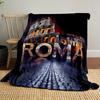 The pattern combines "ROMA" text with images and the Colosseum backdrop. for all seasons blanket lunch break throw gift