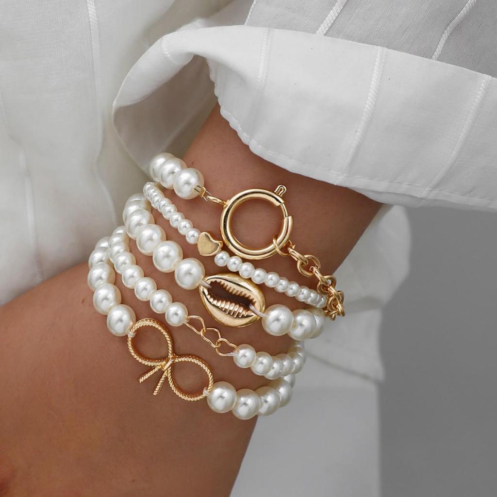 5-Piece Ocean-Inspired Faux Pearl Bracelet Set for Women with Bow, Heart, and Shell Accents