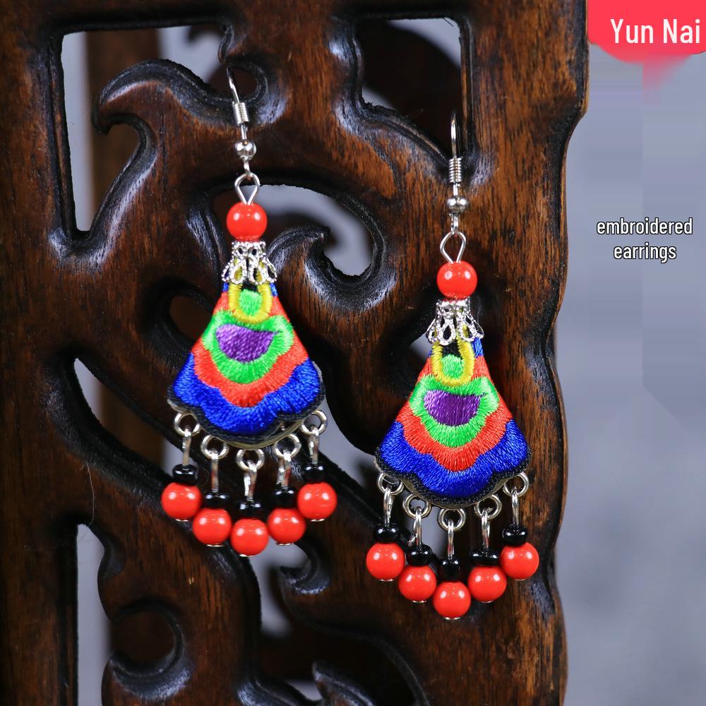 Chinese Retro Plum Blossom Fan Earrings: Women's Qipao Bell Tassel Pendants for Hanfu
