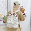 Schoolbag schoolbag female junior high school student high school student campus large capacity double shoulder floral letter ins style high niche 