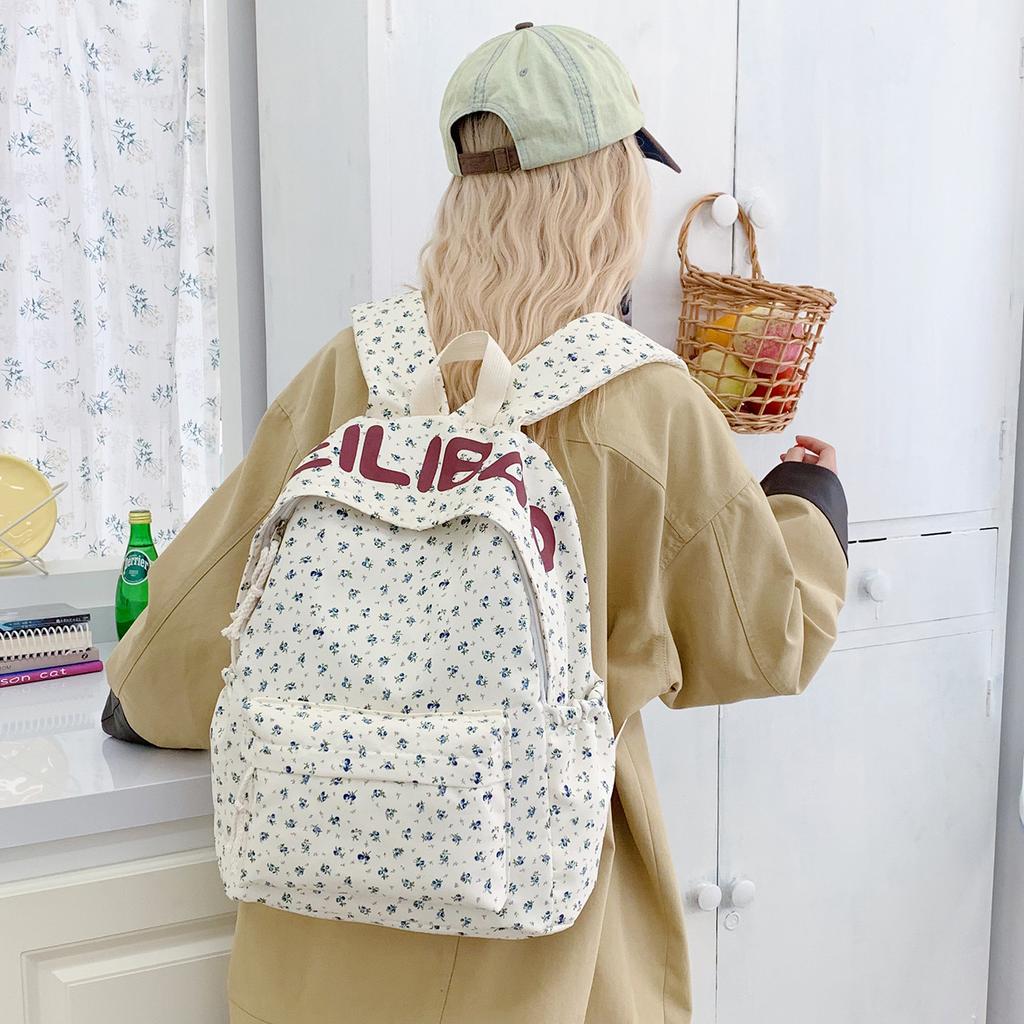 Schoolbag schoolbag female junior high school student high school student campus large capacity double shoulder floral letter ins style high niche