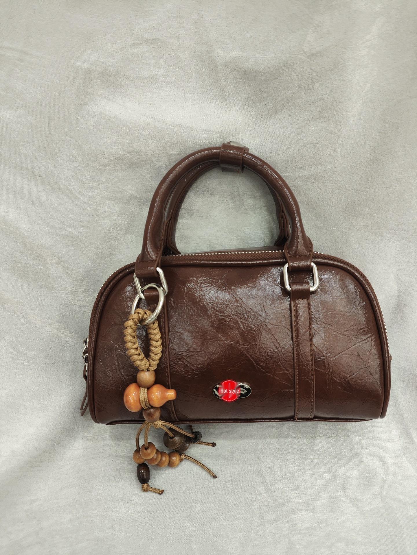 

2025 Autumn/Winter Ingenious Muffin Pillow Women s Handbag: Exquisite Small Tote & Crossbody Bag 21x6x11 cm