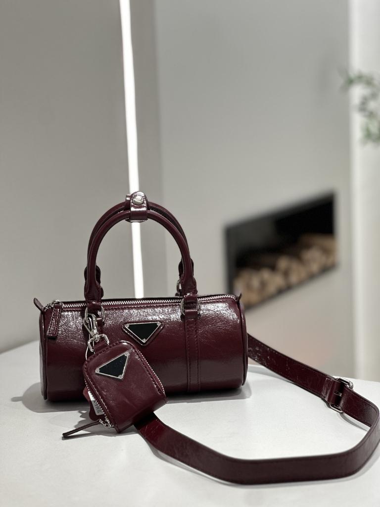 Leather bag New pillow bag Inverted triangular pleated cylinder One shoulder crossbody women's bag Commuter casual handbag