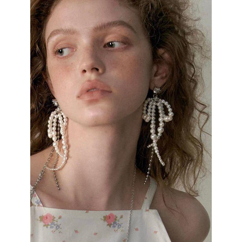 

Cruz Zircon Stringed Pearls Bows Chain Stud Earrings Stud earrings