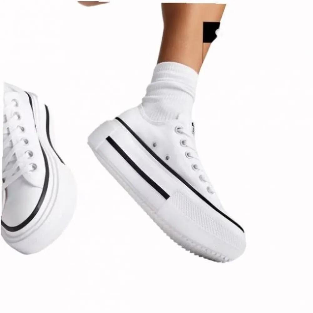 Фирменный магазин Converse Chuck Taylor All Star Lift Double Stack Белый A15491C 240