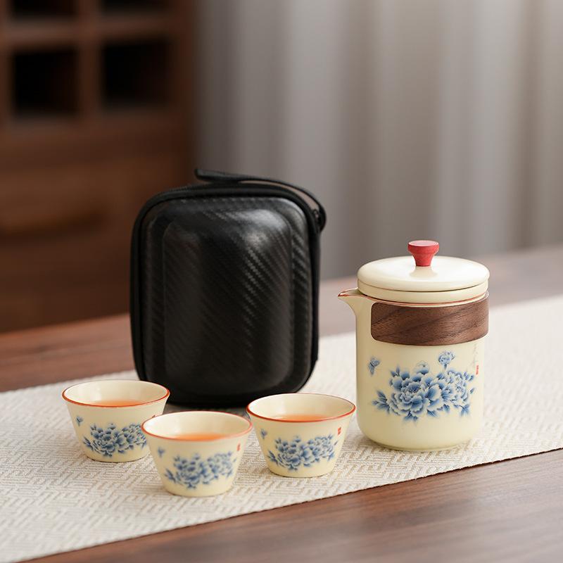 Retro household ceramics new Chinese kung fu tea set Dehua Huang Ru kiln Tianxiang peony high-end gift box
