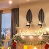 Black Candle Holder Wall Sconces With Leaf Detailing For Adding Warmth To Bedrooms And Living Space
