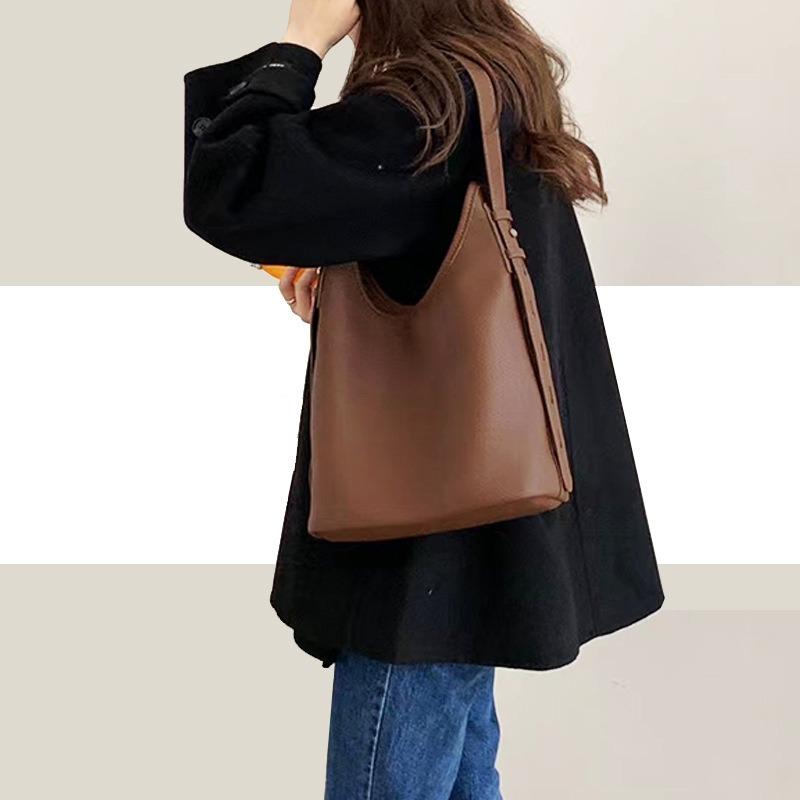 

Niche design shoulder bag adjustment shoulder strap women s large capacity cow leather commuter messenger bag коричневий