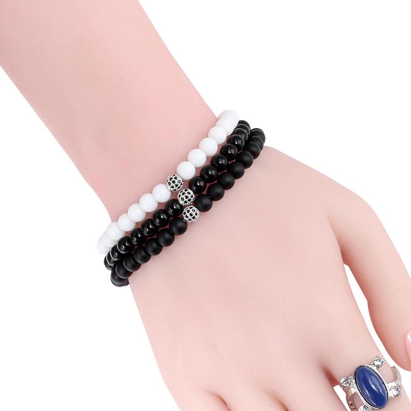 Black Frosted Copper Bead Bracelet with Micro-Inlaid Black Diamond and White Porcelain, Elastic Rope Jewelry for Men and Women.