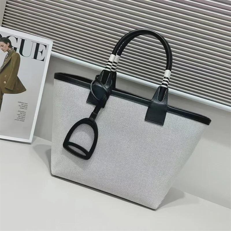 

Женская сумка-тоут из кожи и холста высшего качества 2024 года: Универсальная, вместительная, сумка для ношения в руке или на плече 25 x 15 x 34 cm