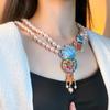 Vibrant Rhinestone Pearl Necklace & Marine Life Tassel Earrings Set