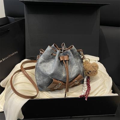 Herbst und Winter beliebt neue Mode personalisierte Spice Girl Wind Eimer Tasche Damen High Sense Nische Pendler Umhängetasche