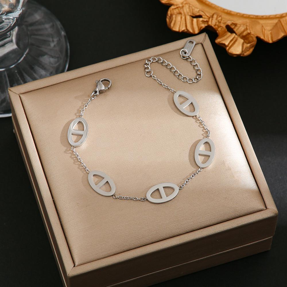 Luxe Titanium Staal Vierbladig Klaver Armband in Koreaanse Stijl met Ingelegde Diamanten voor Vrouwen - Kleurvast