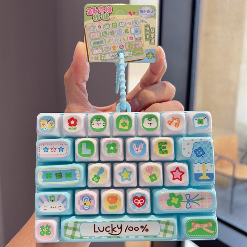 Fidget Tastatur Schlüsselanhänger Kleeblatt 26 Tasten Druckknöpfe Lanyard Einzigartige Stressbewältigung Neujahrsgeschenk für Teenager Kinder