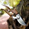 A Modern Carbon Steel Pruning Shear with Japanese SK5 Steel Blades, Featuring an Ergonomic Wooden Handle, Heavy-Duty Side-Cutting Scissors Designed
