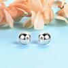 Jewelry round bead glossy stud earrings, simple spherical earrings, and a silver needle.