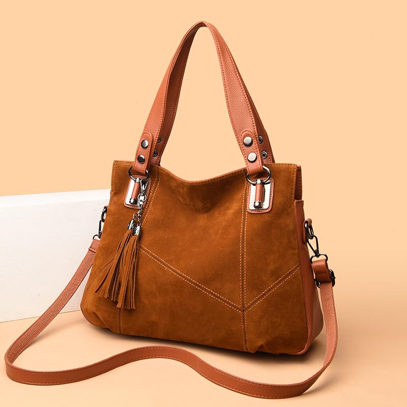 New retro big bag fashionable splicing PU fringed portable shoulder large capacity messenger commuter women's bag