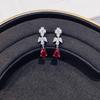 Elegante Rote Edelstein-Hängeohrringe für Damen Klassisches Blumen-Design Leichter Luxus Brautschmuck