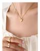 Hong Kong-Style Elegant Heart-Shaped Cat's Eye Stone Pendant Necklace On Gold-Plated Clavicle Chain.
