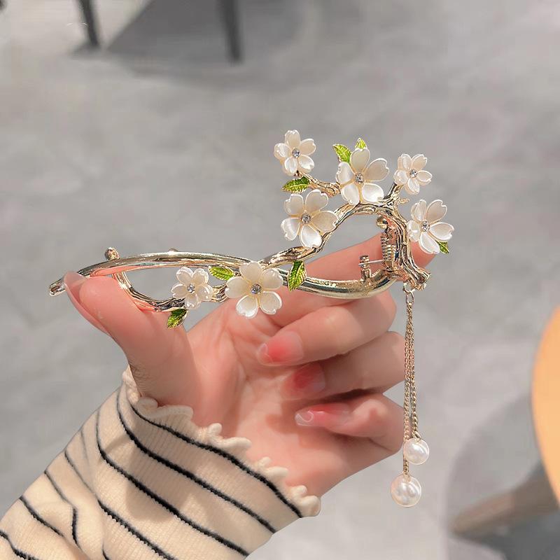 Factory direct fashion flower pearl twist clip elegant hairpin Internet celebrity head spring clip
