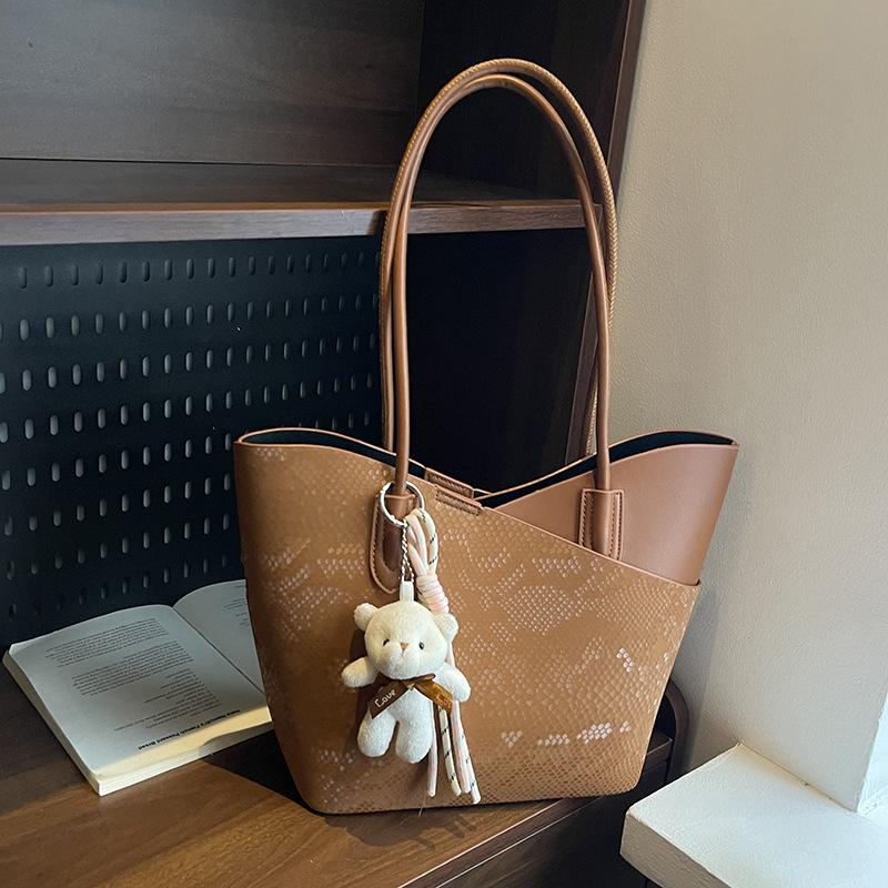 Premium Tasche Damen neue Mode vielseitige Schultertasche große Kapazität Nische Pendler Tragetasche