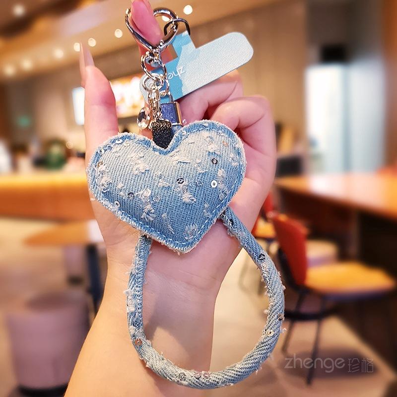 

Fashion women s high-value mobile phone lanyard ins wrist short hole denim love pendant outdoor mountaineering