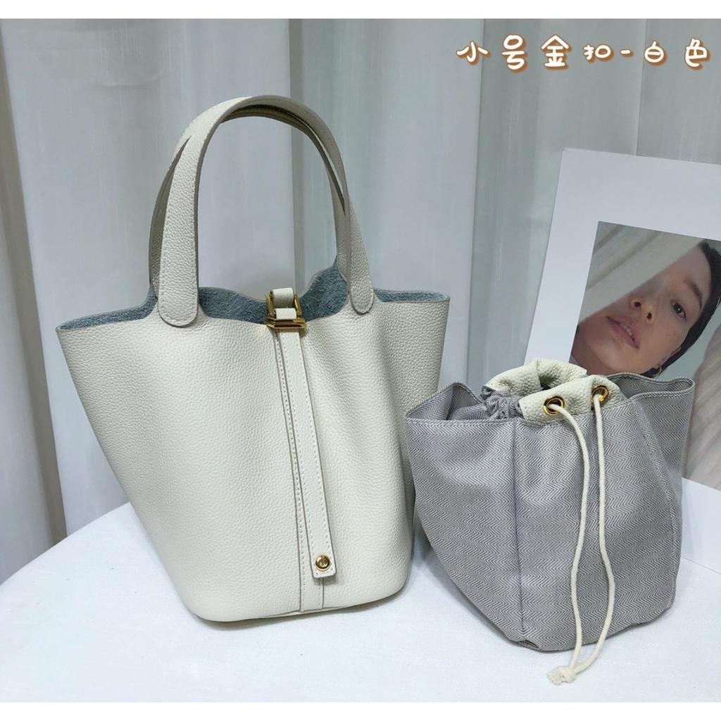 Spot wholesale top layer cowhide vegetable basket bag leather bucket bag commuter fashion lock buckle hand-held handbag woman