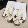 Flat-bottomed slippers women's 2025 summer new bag head mesh one-word drag bow cool slippers women