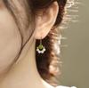 Chinese Jade Moon Tassel Earrings: Unique Design & Elegant Trend
