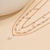 Multi-layer Pearl Pendant Necklace: European & American Design, Niche, Three-layer Clavicle Chain, Versatile for Women, Ideal for Vacation
