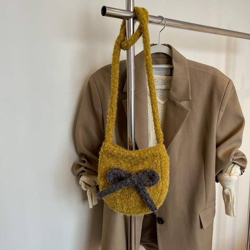 Korean spring new fashion niche design large-capacity student foreign style bucket bag women's shoulder trend oblique span bag