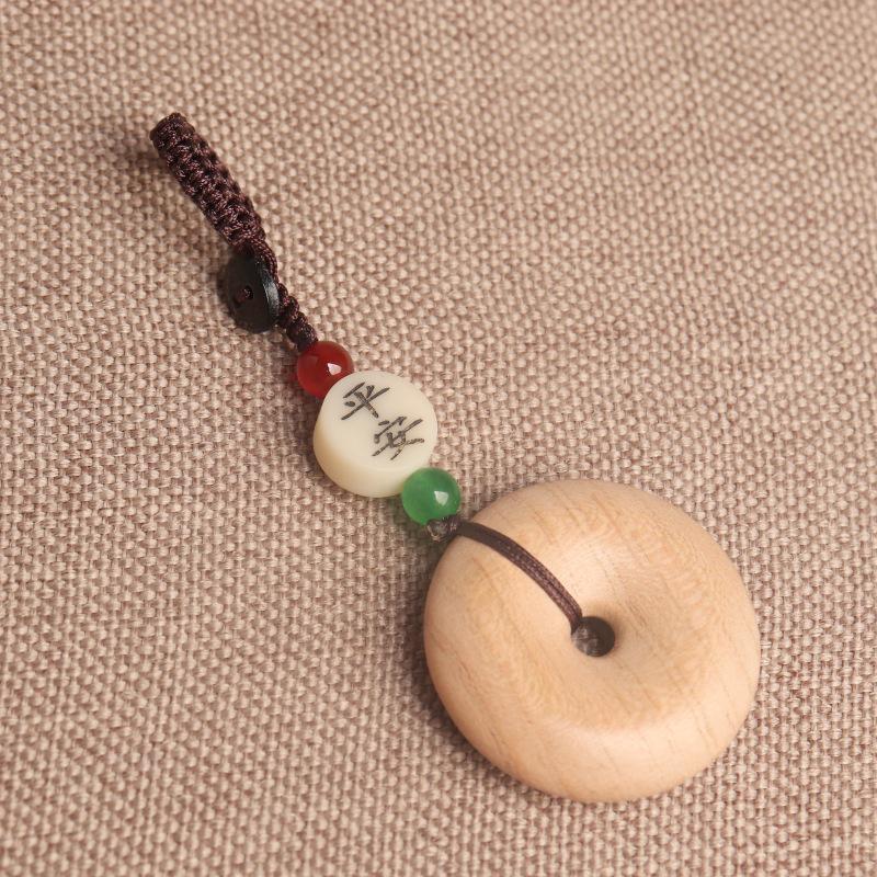 

Фэйчэнский резной кулон из персикового дерева в виде облака и пряжки мира для мужчин и женщин