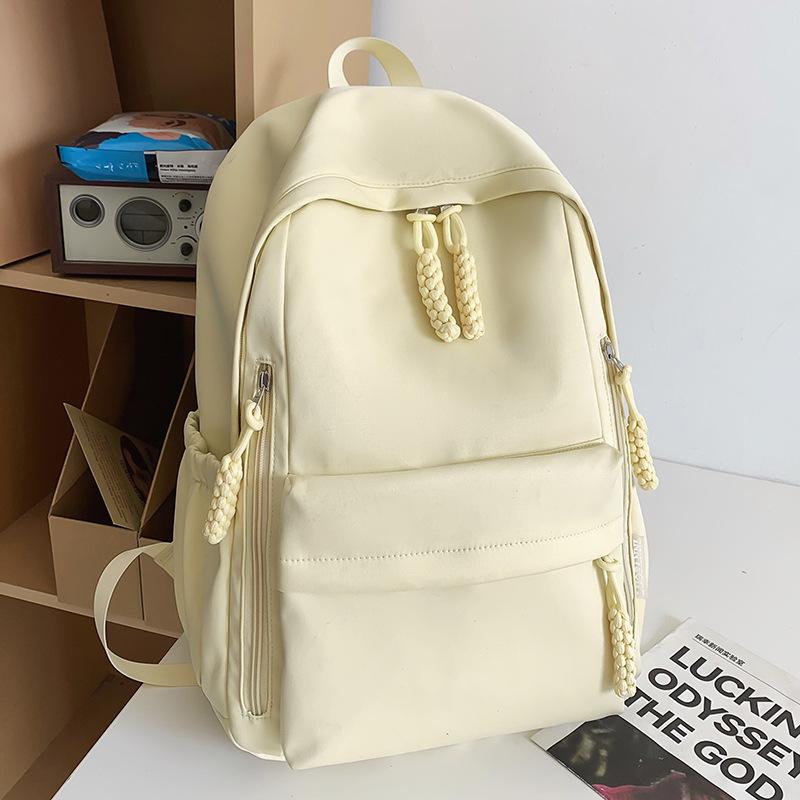 School bag children, elementary school students, girls, junior high school students, high school simple solid color college students, backpack,