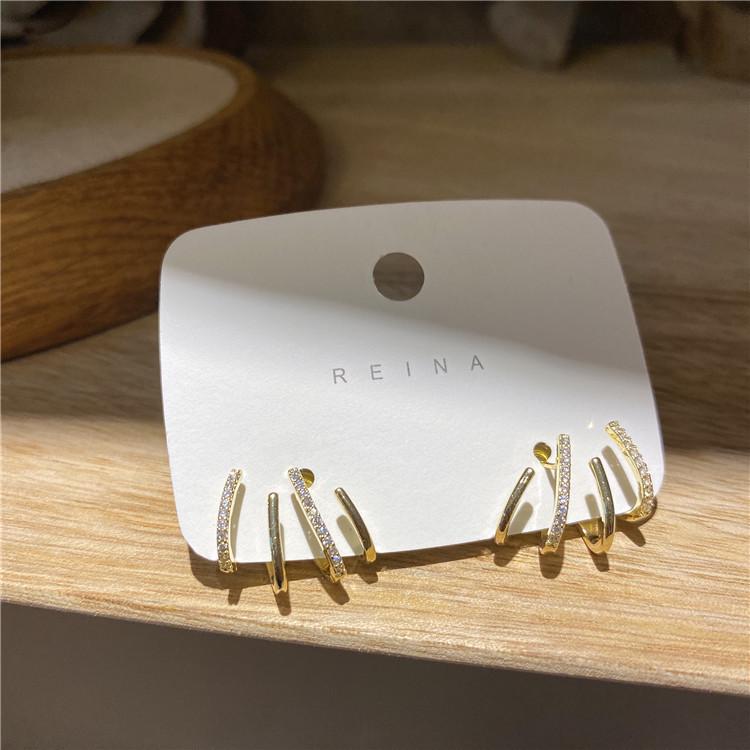 Retro Niche Design S925 Sterling Silver Four-Prong Micro-Paved Stud Earrings - Exquisite, High-End Temperament Jewelry.