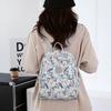Schoolbag Casual Printed Backpack Women's Large Capacity Shell Bag 1011 New Women's Commuter Small Backpack Nylon School Bag